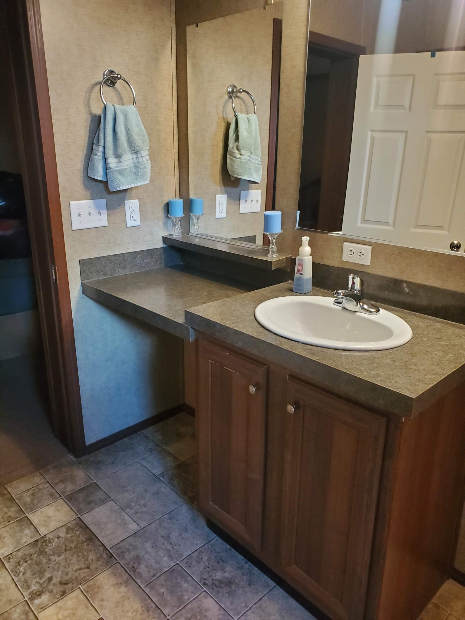 411 West Martin Road Collinwood, TN 38450 - Photo 14 of 23 a bathroom with a double vanity sink and a mirror