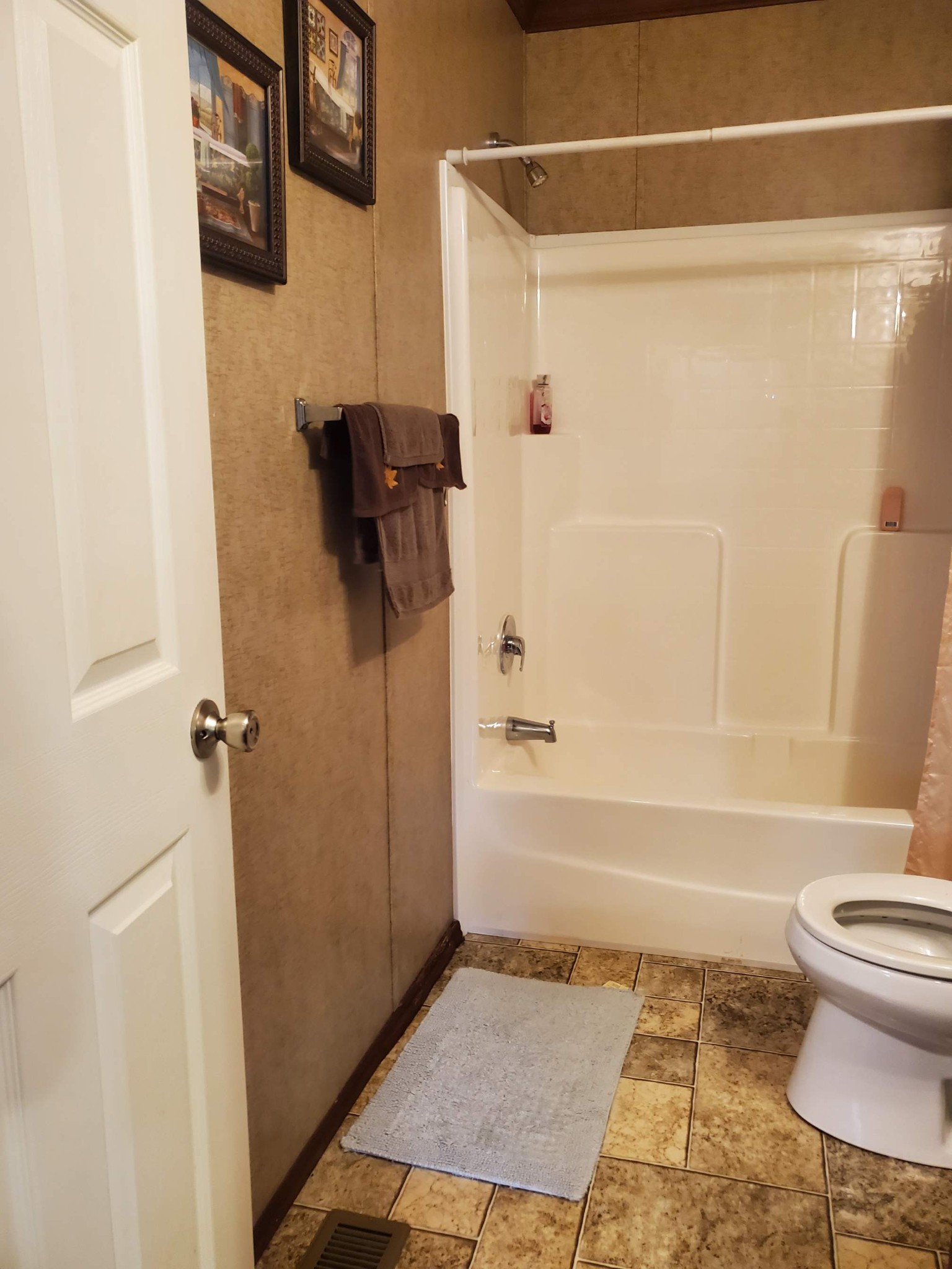 411 West Martin Road Collinwood, TN 38450 - Photo 17 of 23 a bathroom with a toilet and a shower