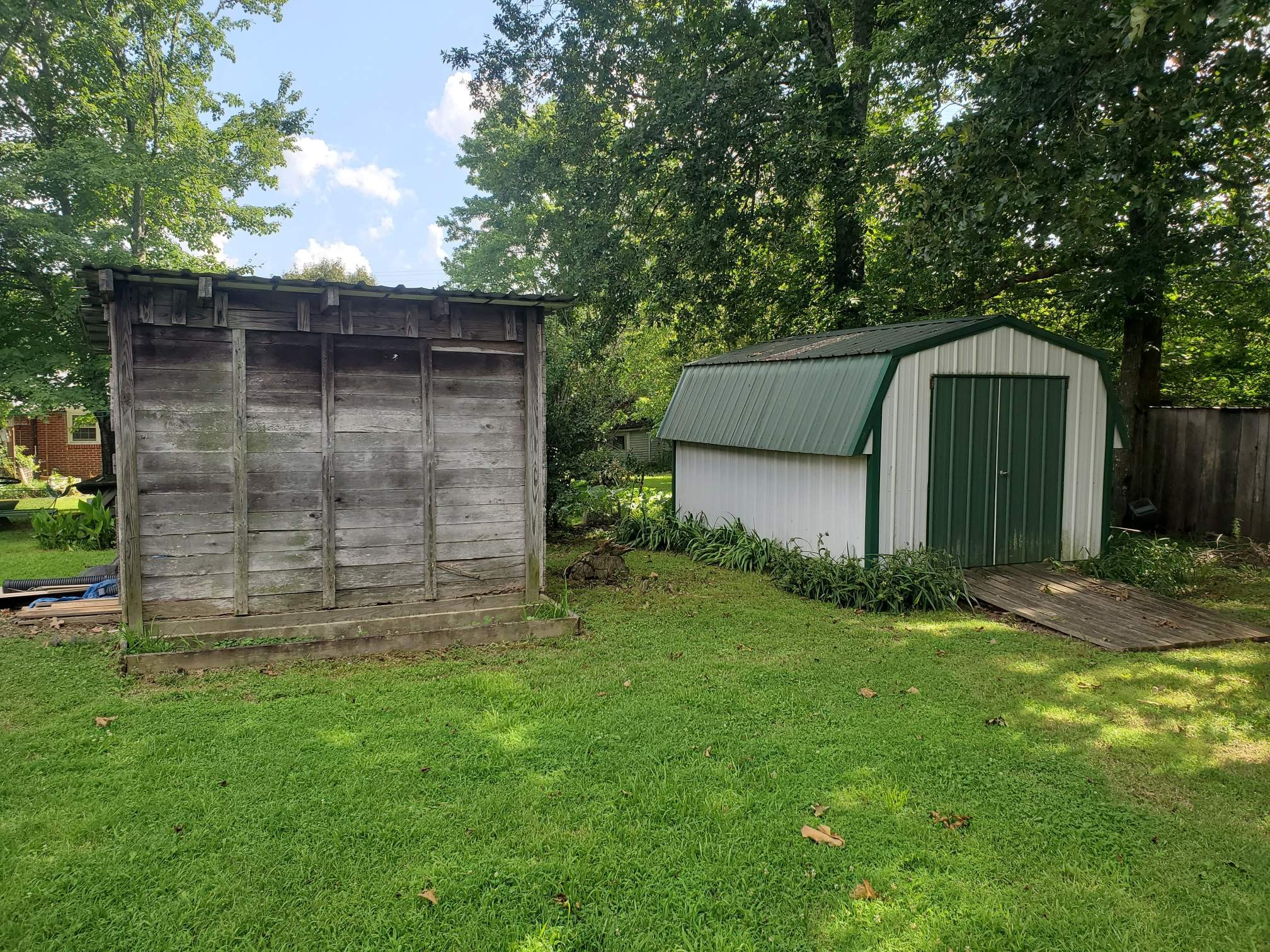 411 West Martin Road Collinwood, TN 38450 - Photo 21 of 23 a view of a tiny house with a yard