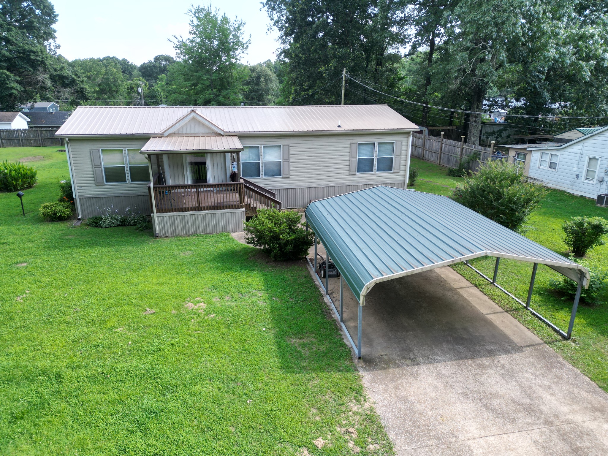 411 West Martin Road Collinwood, TN 38450 - Photo 3 of 23 a aerial view of a house with a yard