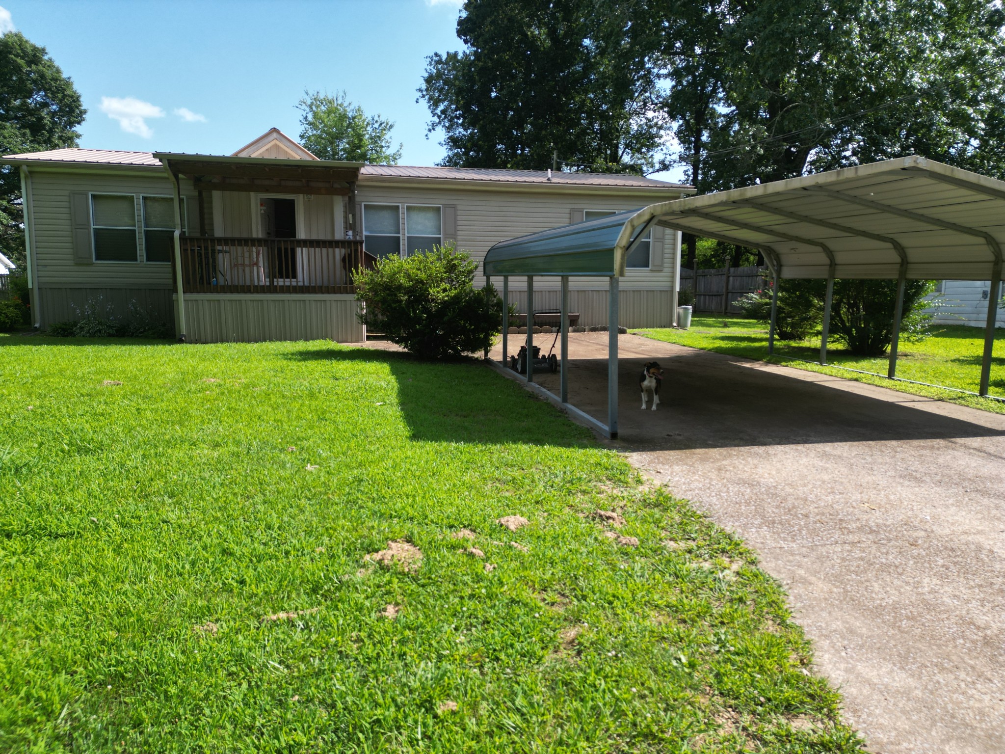 411 West Martin Road Collinwood, TN 38450 - Photo 5 of 23 a front view of a house with garden