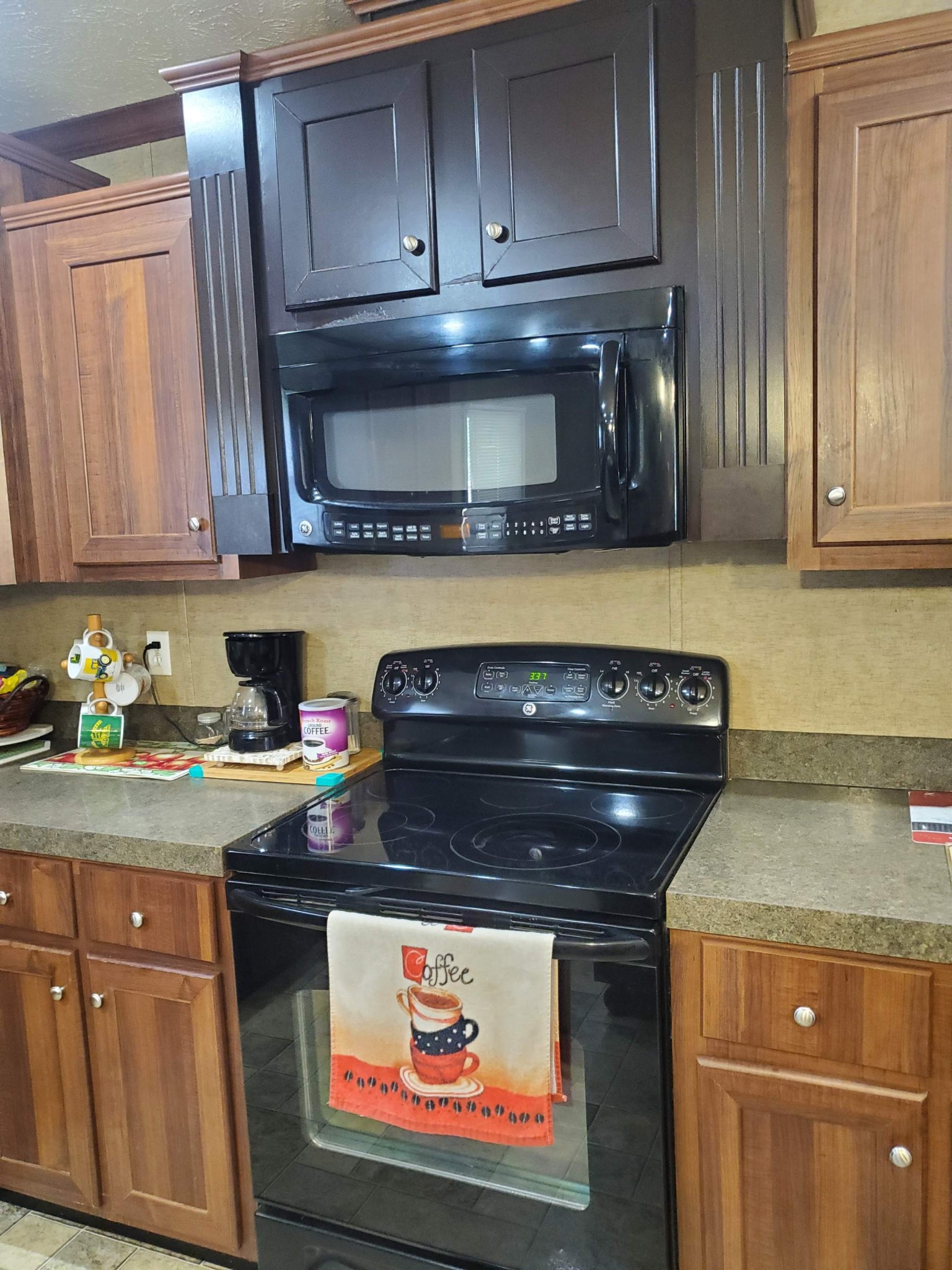 411 West Martin Road Collinwood, TN 38450 - Photo 7 of 23 a kitchen with a stove and cabinets