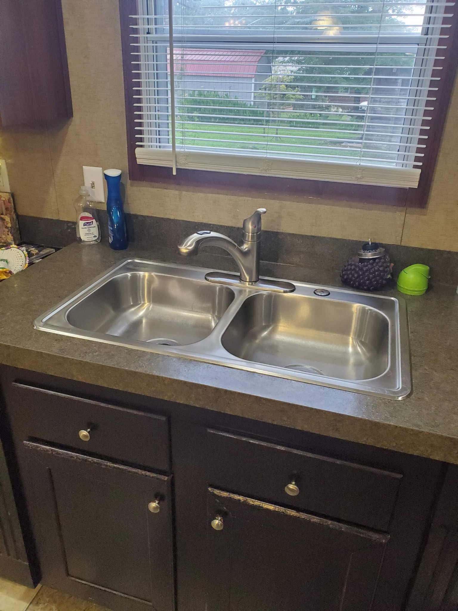 411 West Martin Road Collinwood, TN 38450 - Photo 8 of 23 a kitchen sink with a granite countertop window