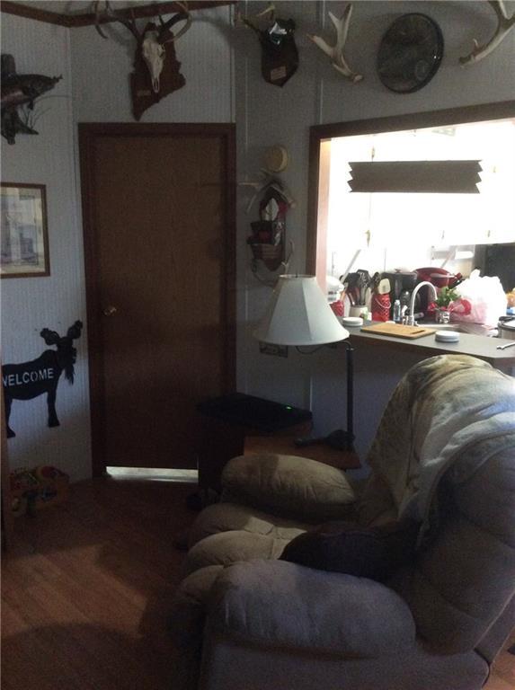 566 Rogers Point Road Steuben, ME 04680 - Photo 18 of 28 Living Room looking into kitchen,...