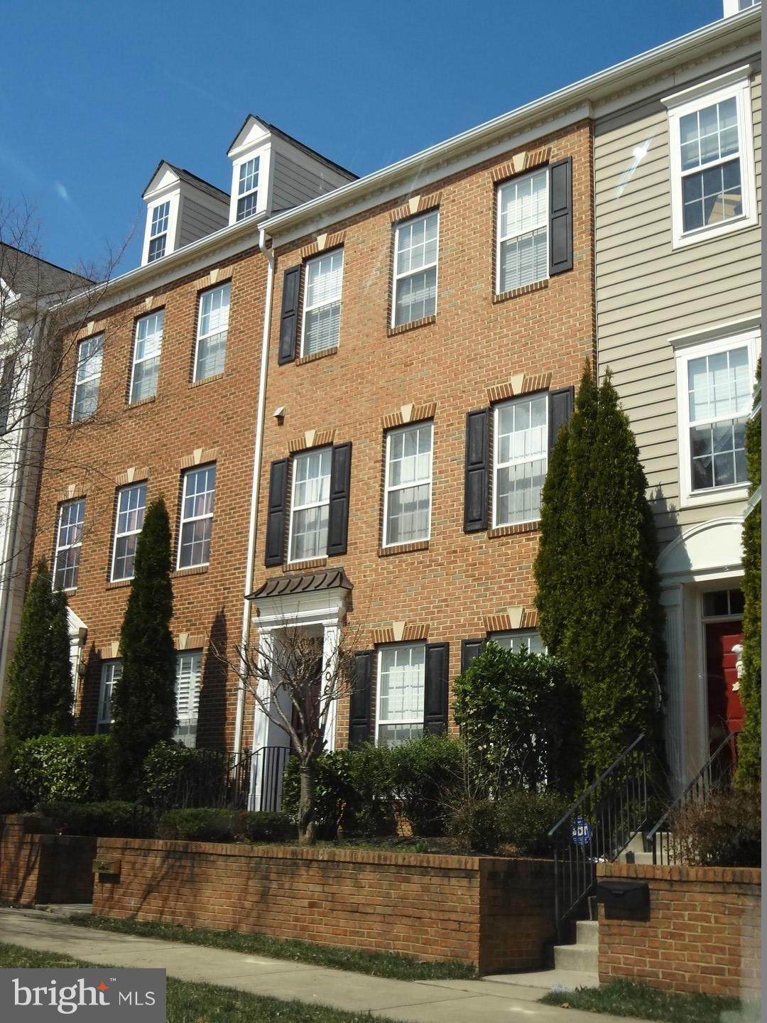 409 Phelps Street Gaithersburg, MD 20878 - Photo 1 of 1 a front view of a house with garden