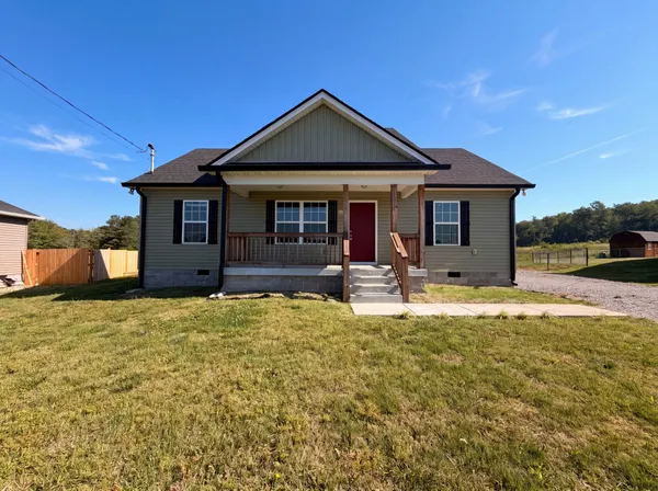 a front view of house with yard