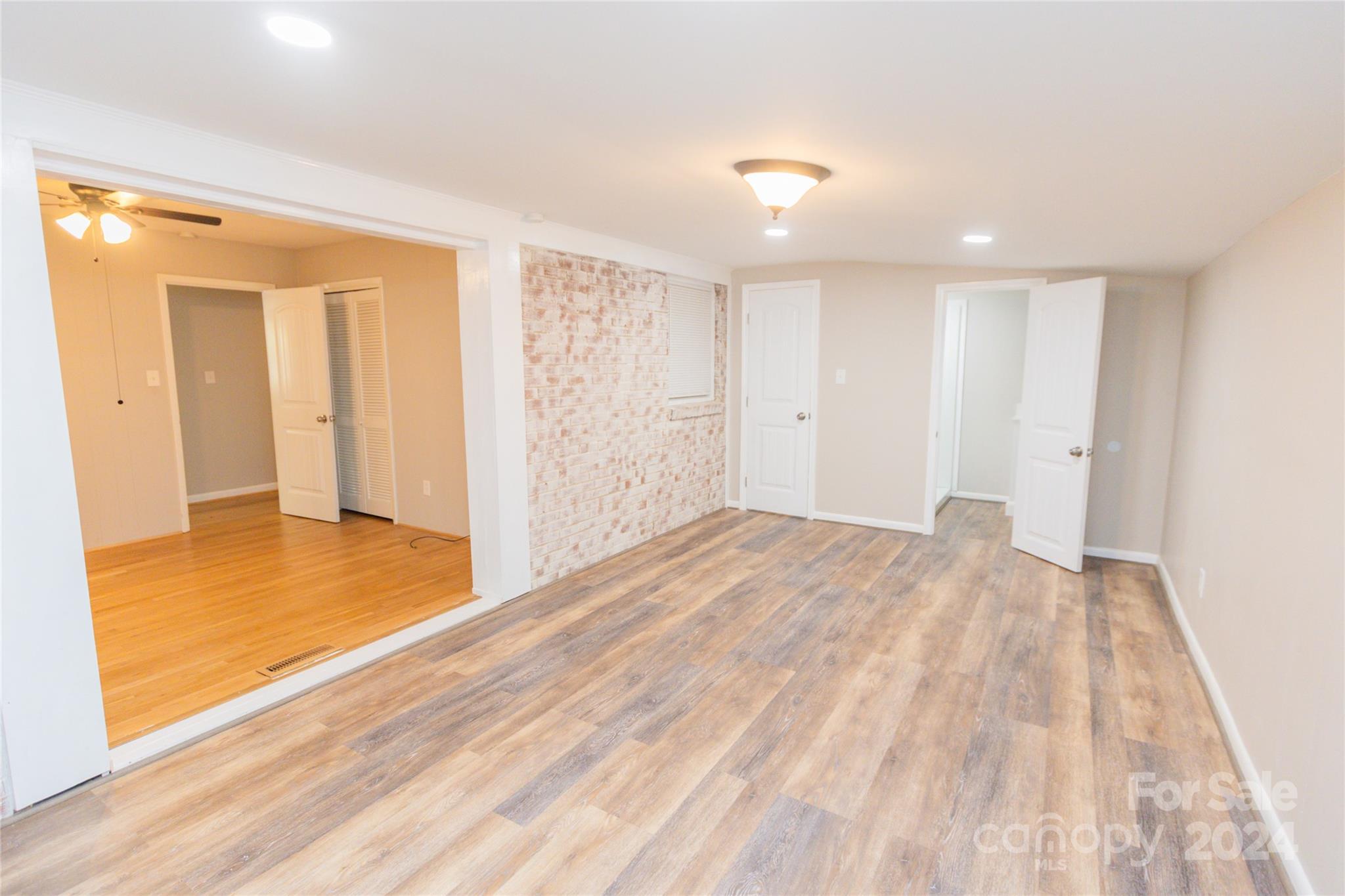 111 Colonial Avenue Lancaster, SC 29720 - Photo 19 of 40 a view of hallway with wooden floor