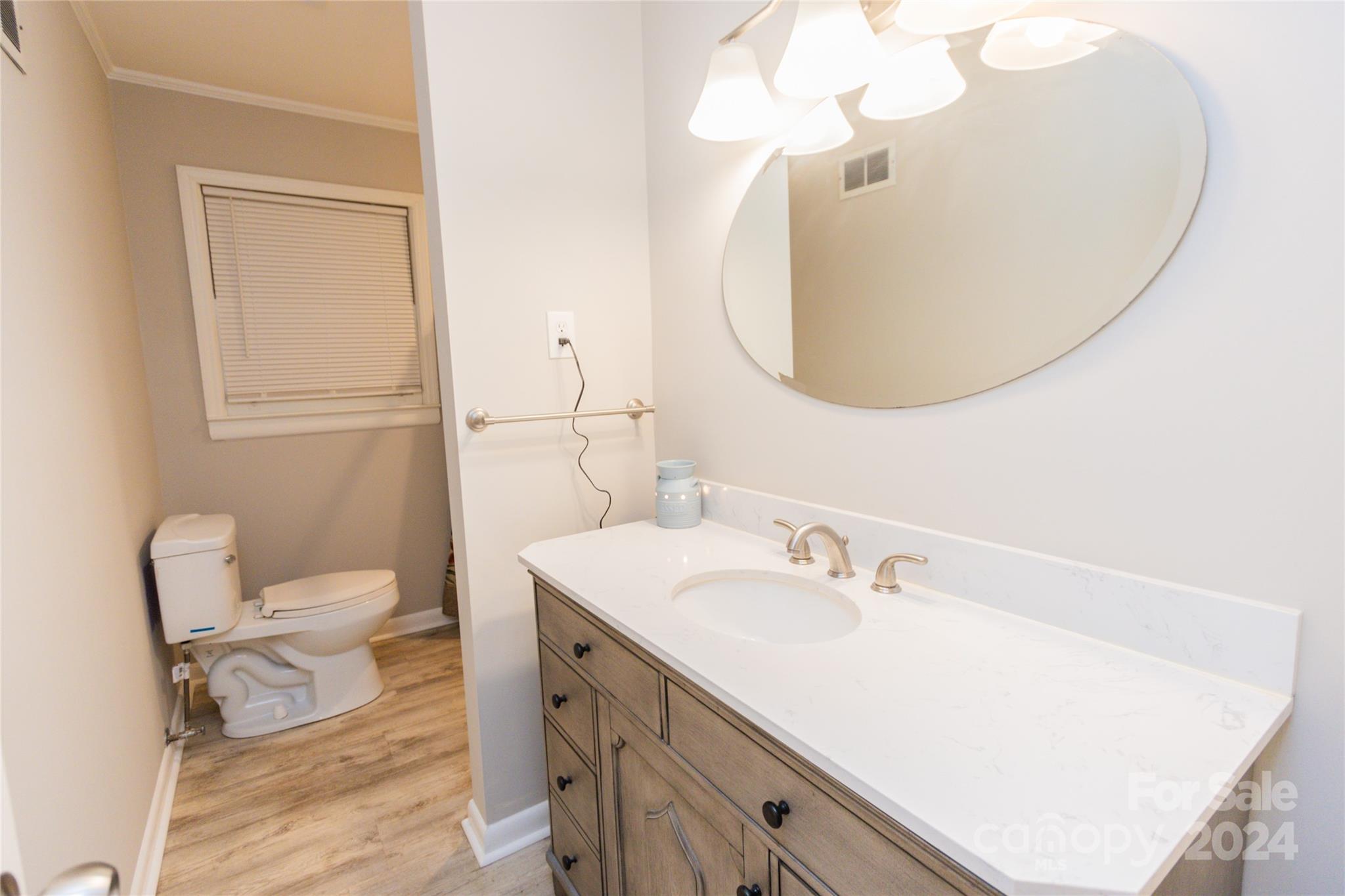 111 Colonial Avenue Lancaster, SC 29720 - Photo 20 of 40 a bathroom with a sink mirror and toilet