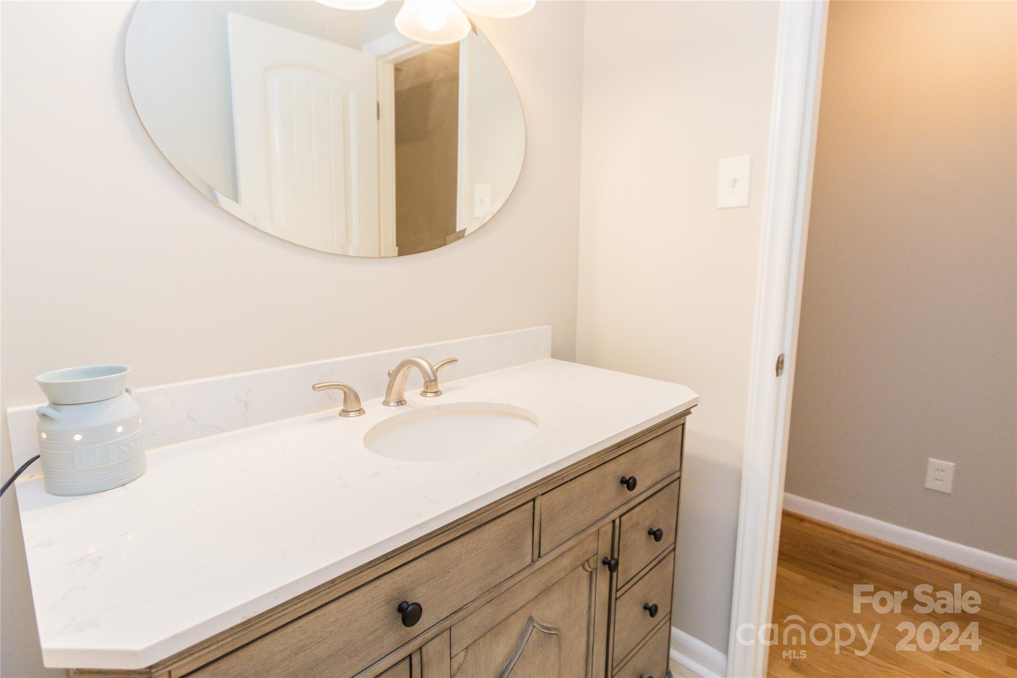 111 Colonial Avenue Lancaster, SC 29720 - Photo 22 of 40 a bathroom with a sink and a mirror