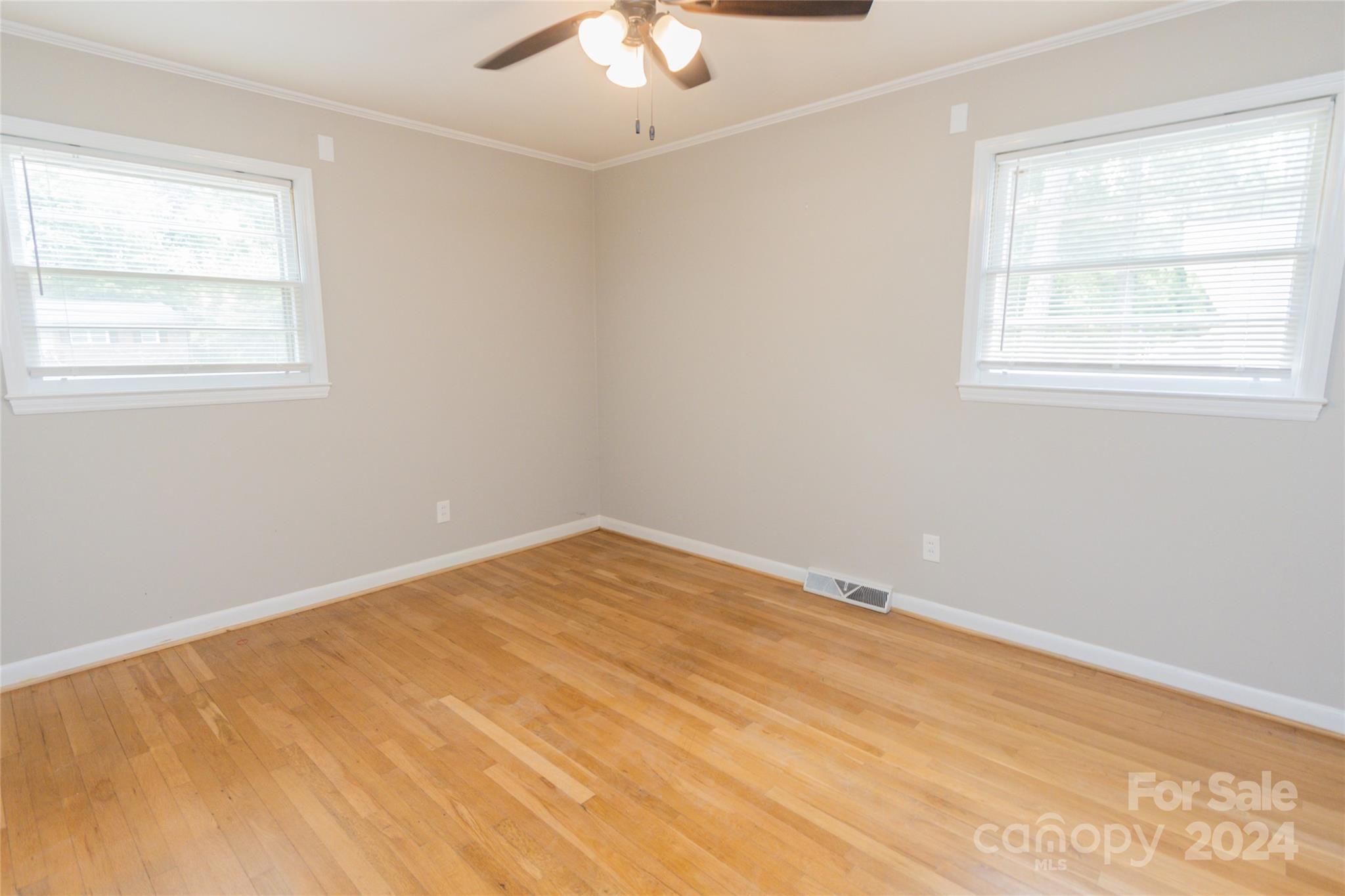 111 Colonial Avenue Lancaster, SC 29720 - Photo 23 of 40 a view of an empty room with a window