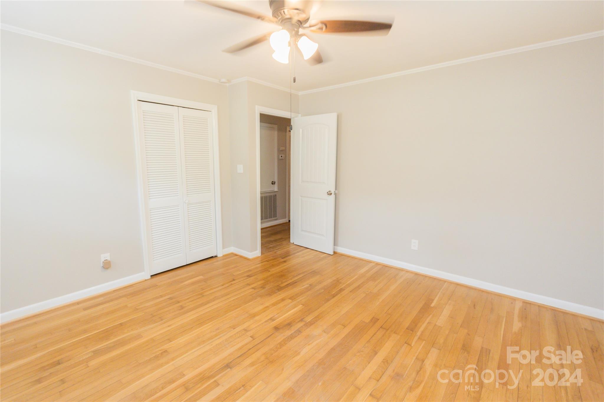 111 Colonial Avenue Lancaster, SC 29720 - Photo 29 of 40 a view of empty room with wooden floor