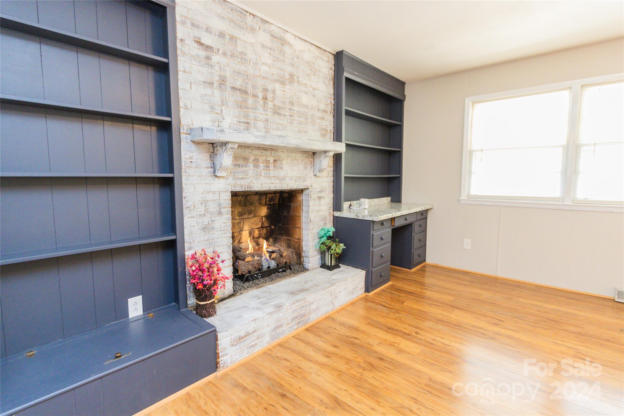 111 Colonial Avenue Lancaster, SC 29720 - Photo 30 of 40 a living room with furniture and a fireplace