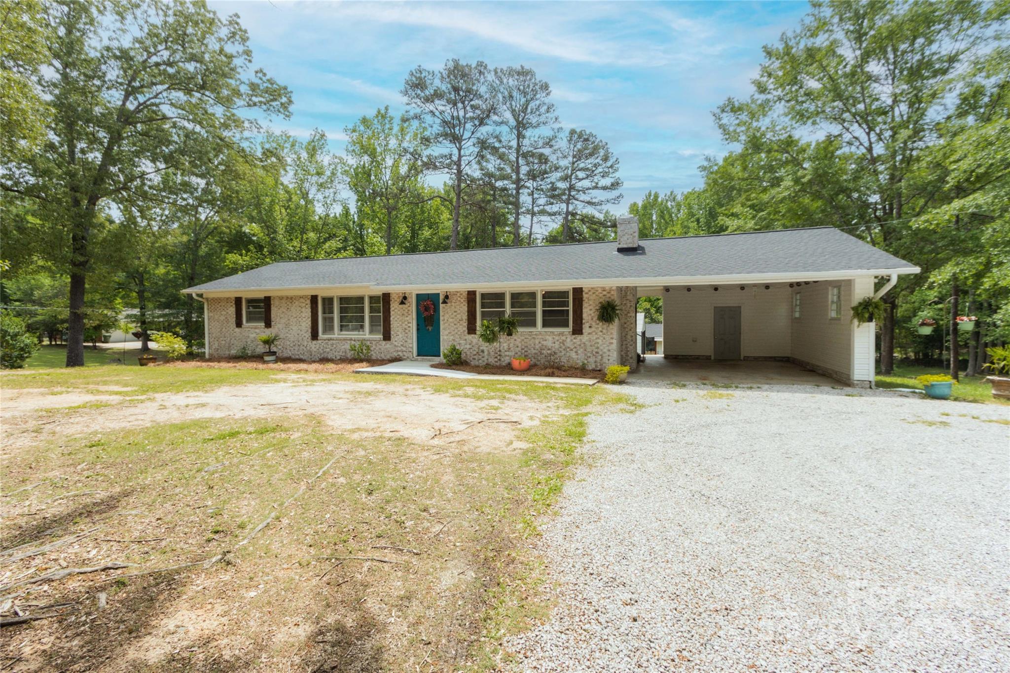 111 Colonial Avenue Lancaster, SC 29720 - Photo 38 of 40 a view of a house with a swimming pool
