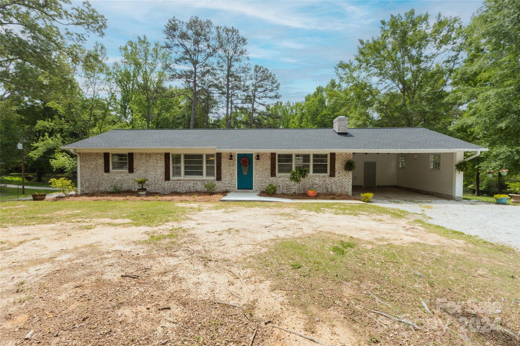 111 Colonial Avenue Lancaster, SC 29720 - Photo 39 of 40 a front view of a house with swimming pool