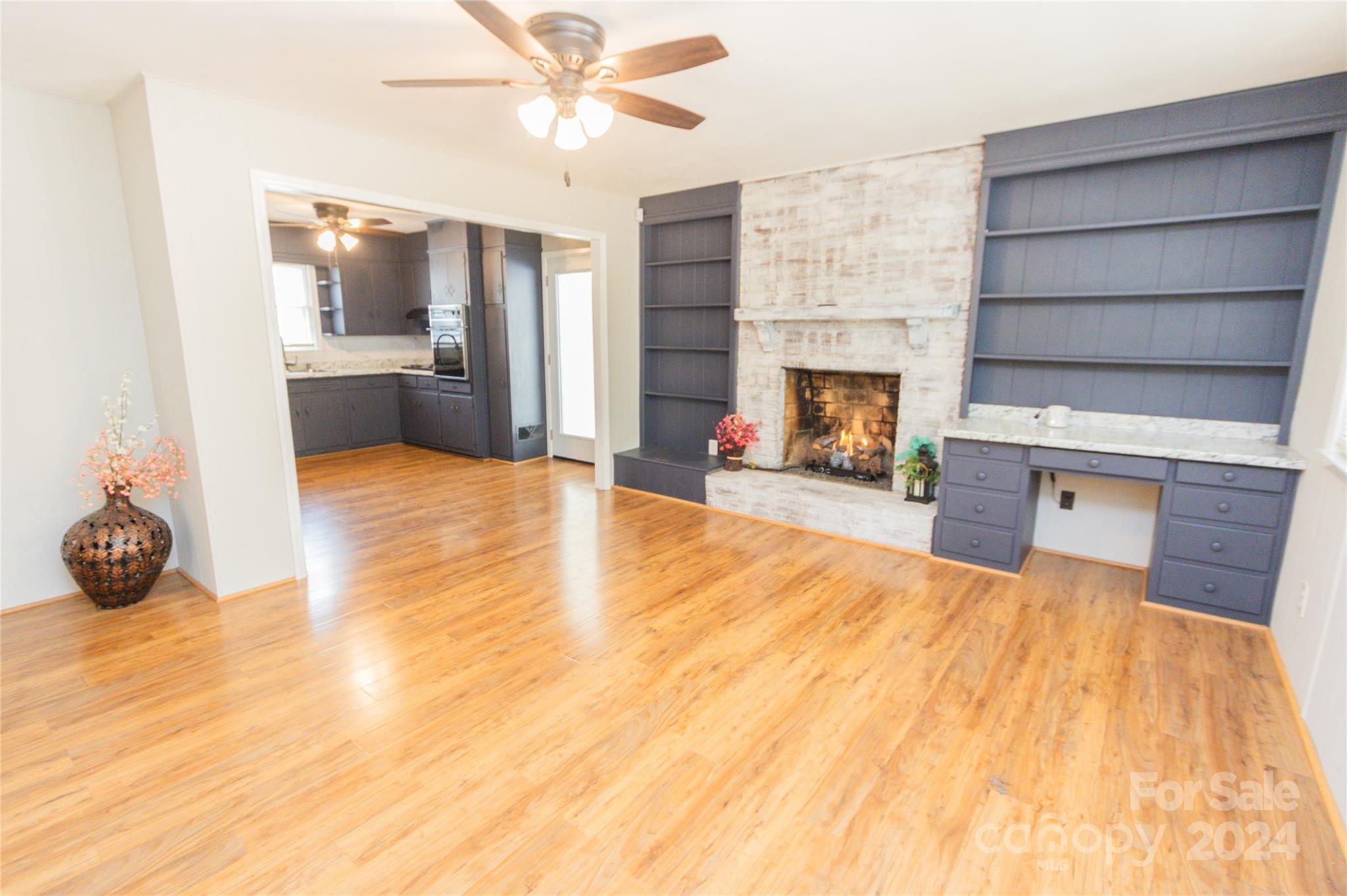 111 Colonial Avenue Lancaster, SC 29720 - Photo 7 of 40 a view of a livingroom with a fireplace