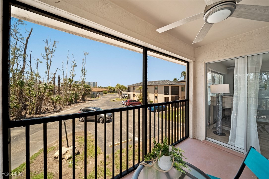 16881 Davis Road, Unit 721 Fort Myers, FL 33908 - Photo 20 of 23 a view of a balcony with furniture
