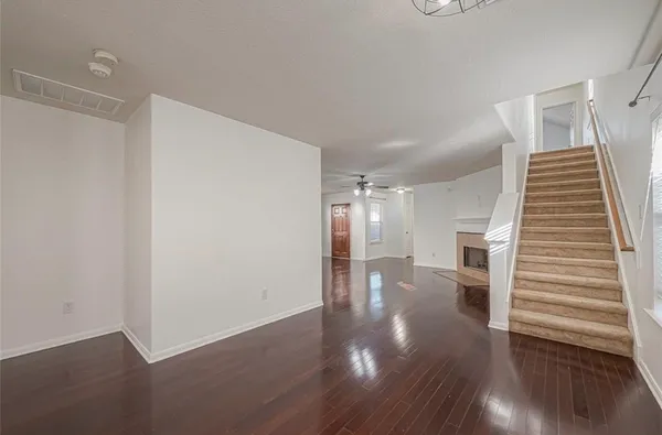 a view of entryway with wooden floor