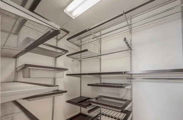 a kitchen with a stove and a microwave