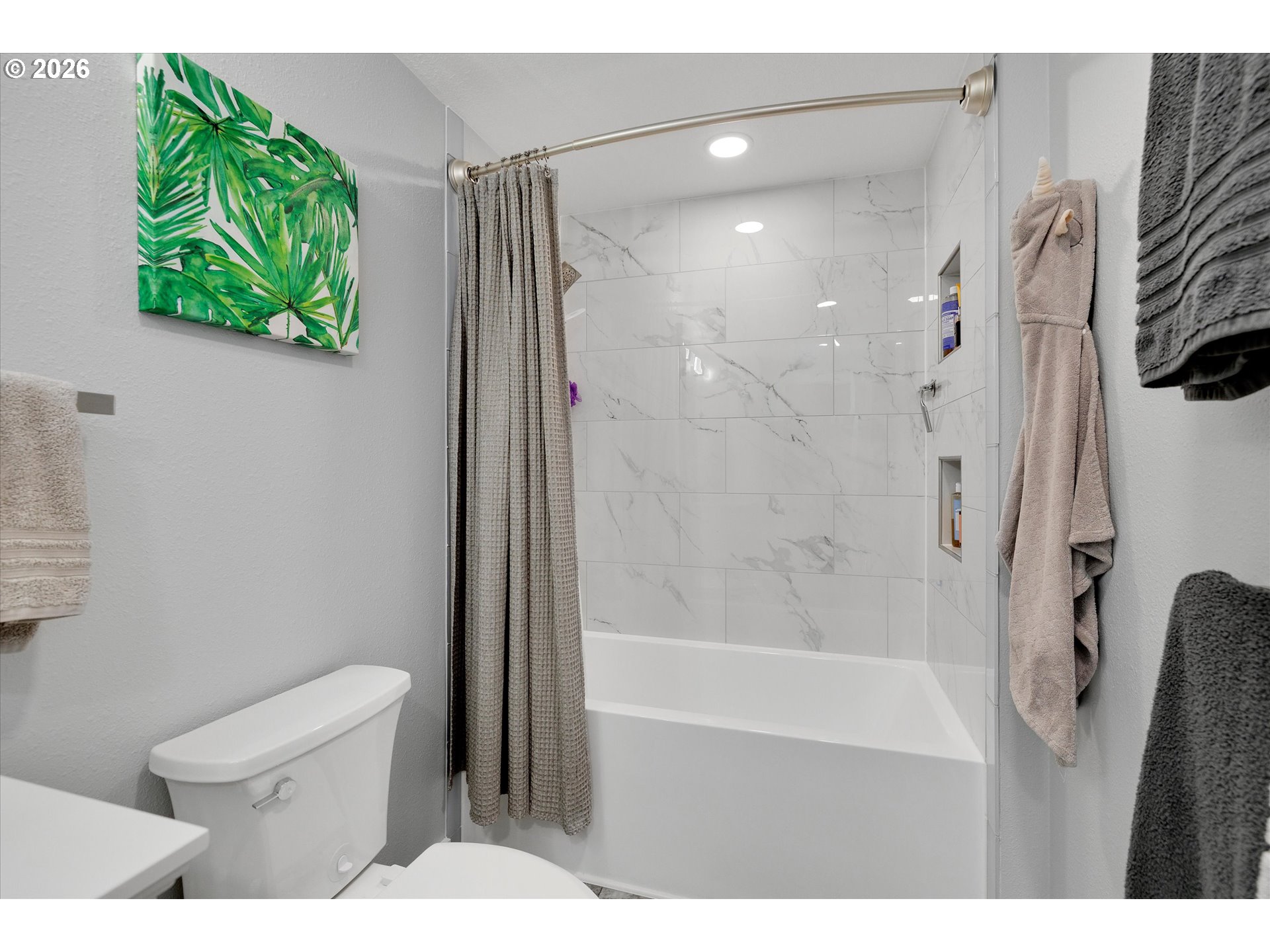 1144 North Pine Street Canby, OR 97013 - Photo 23 of 41 a bathroom with a shower and a toilet