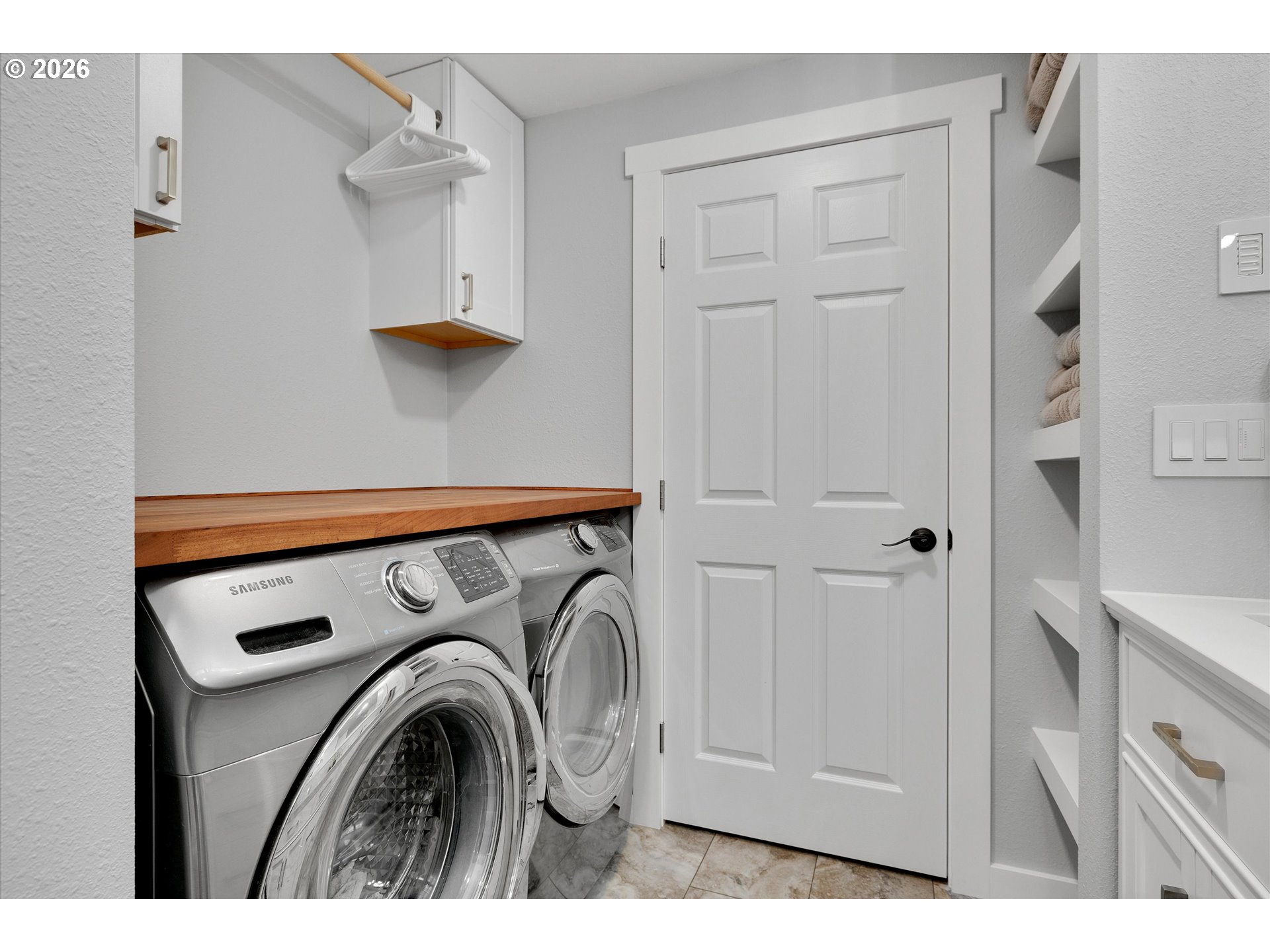 1144 North Pine Street Canby, OR 97013 - Photo 24 of 41 a utility room with dryer and washer