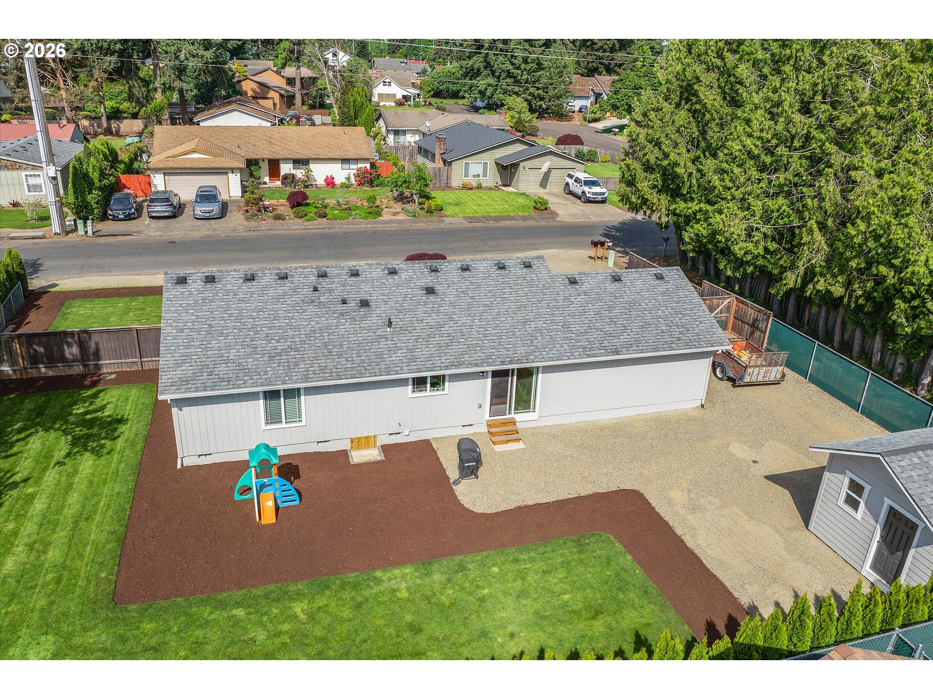 1144 North Pine Street Canby, OR 97013 - Photo 30 of 41 an aerial view of a house with yard swimming pool and outdoor seating