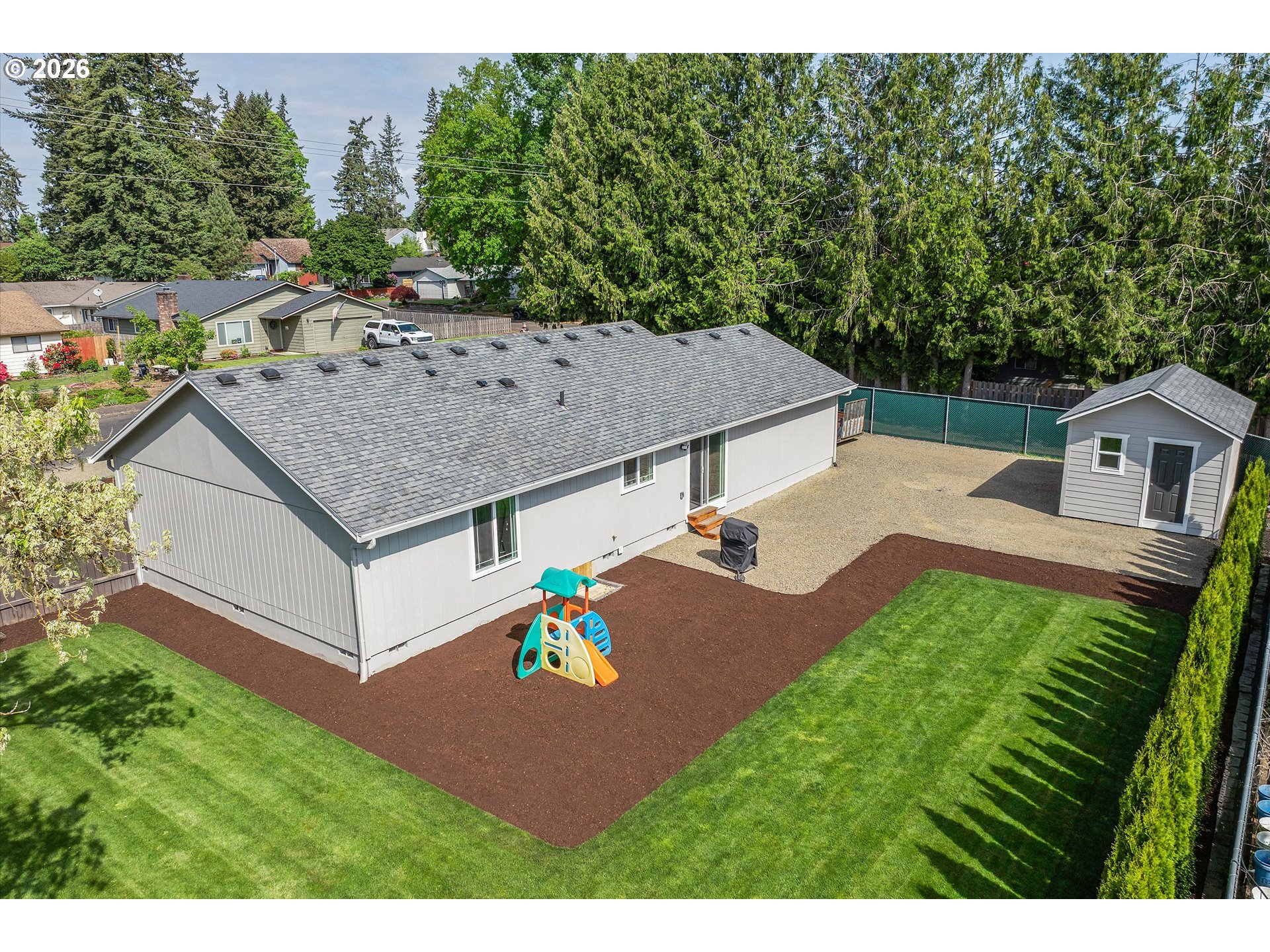 1144 North Pine Street Canby, OR 97013 - Photo 31 of 41 an aerial view of a house