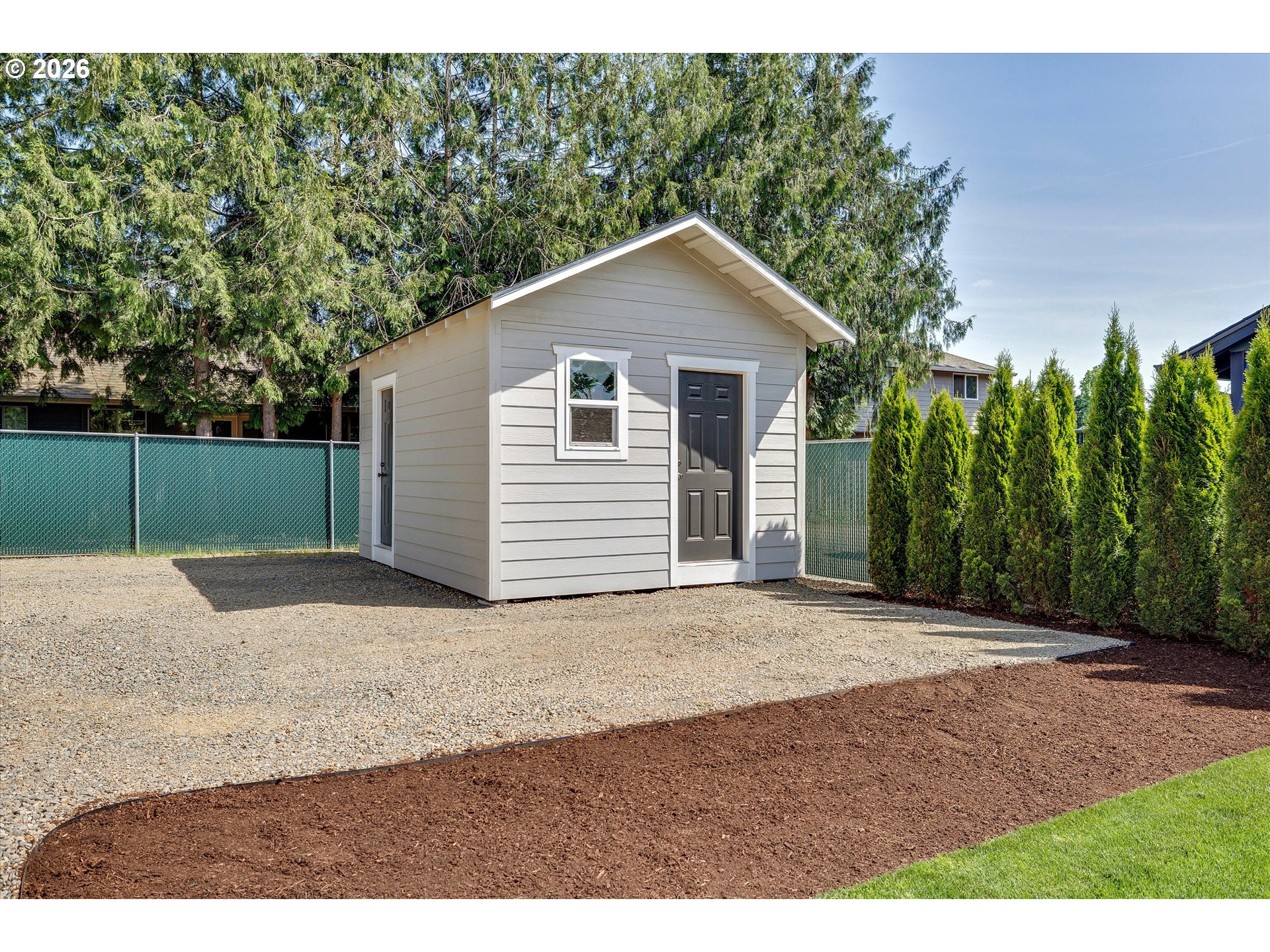 1144 North Pine Street Canby, OR 97013 - Photo 34 of 41 a view of a backyard of house
