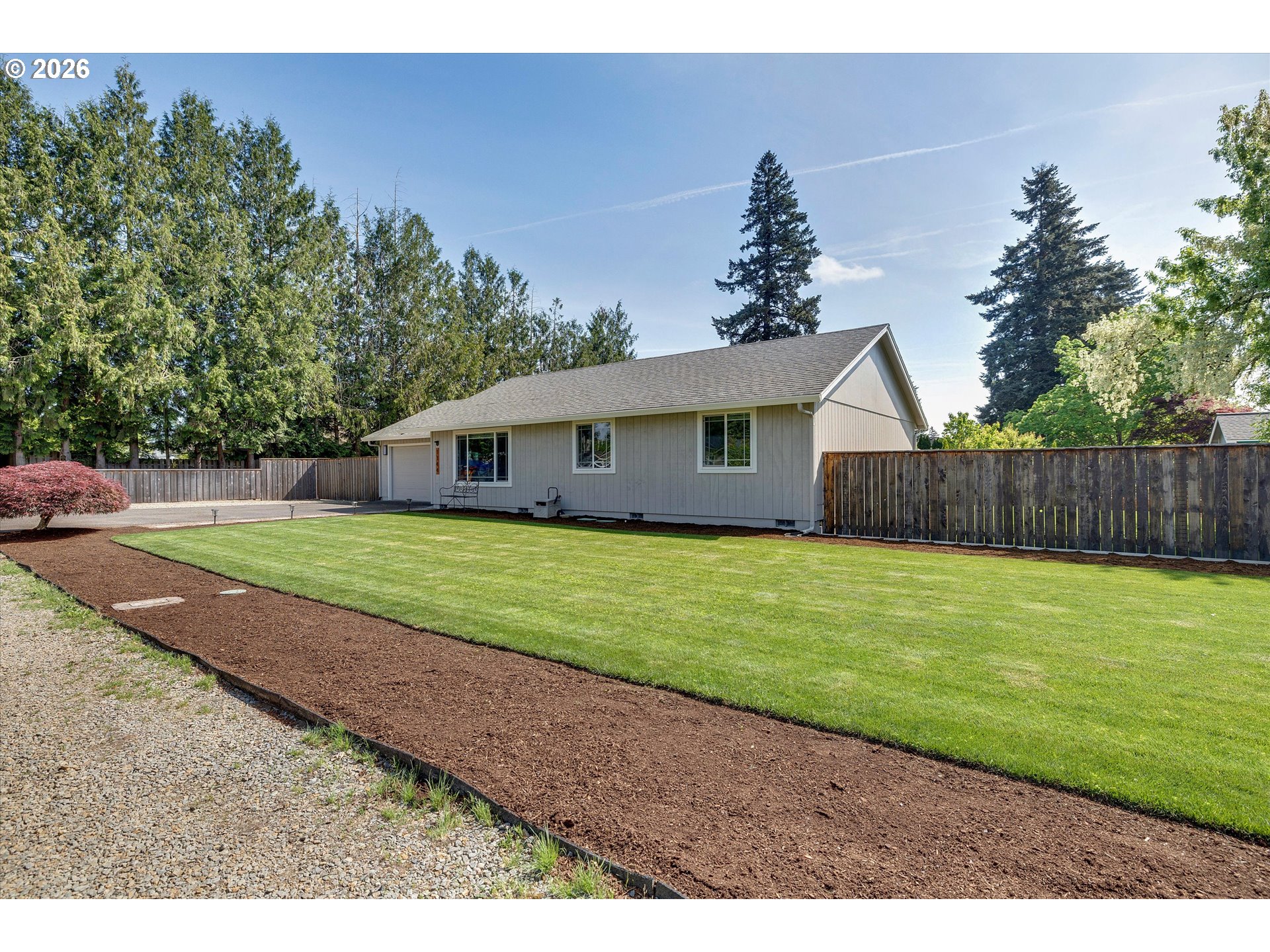 1144 North Pine Street Canby, OR 97013 - Photo 38 of 41 a front view of a house with a yard