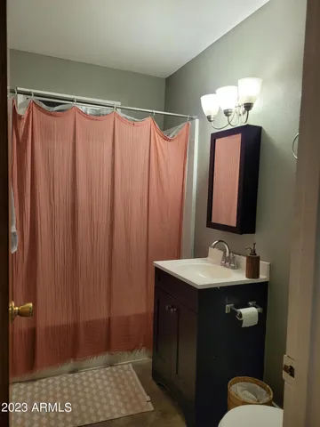 a view of hallway that has couch in it