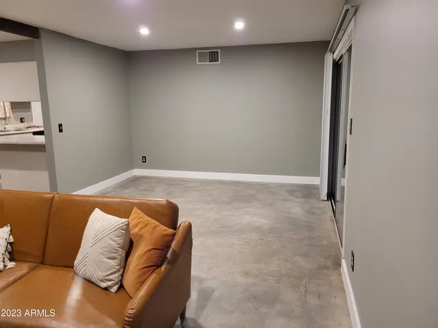 a kitchen with stainless steel appliances granite countertop a stove and a microwave