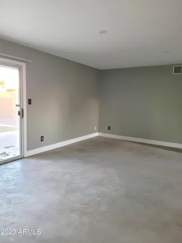an empty room with an entryway