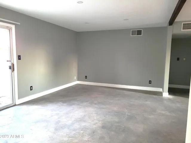 a room with furniture and windows