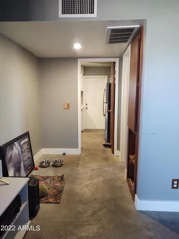 a view of an ocean and a floor to ceiling window