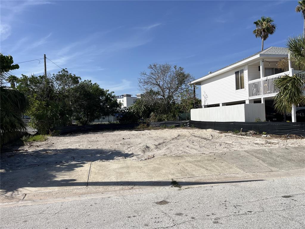 180 East Madeira Avenue Madeira Beach, FL 33708 - Photo 2 of 4 a view of a yard with a house