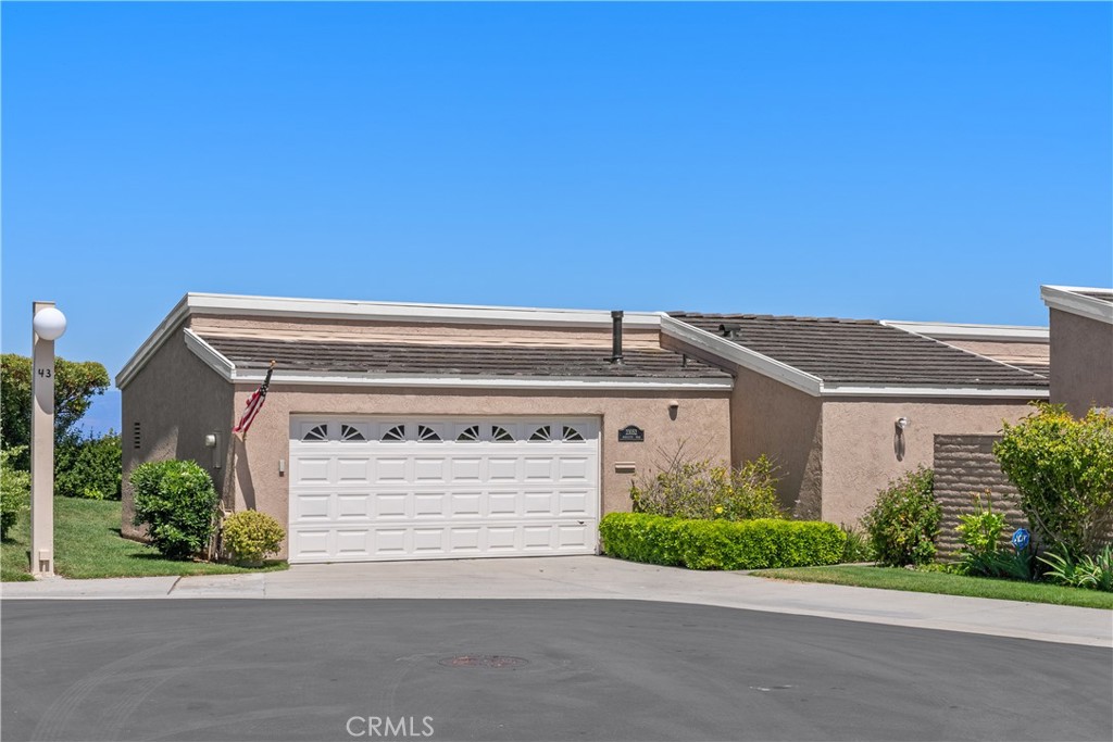 23052 Maraleste Road Laguna Niguel, CA 92677 - Photo 1 of 1 a front view of a house with a garage