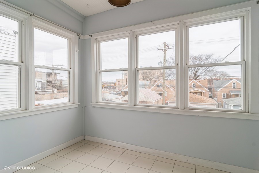 3935 North Christiana Avenue, Unit 2 Chicago, IL 60618 - Photo 11 of 12 a view of empty room with window