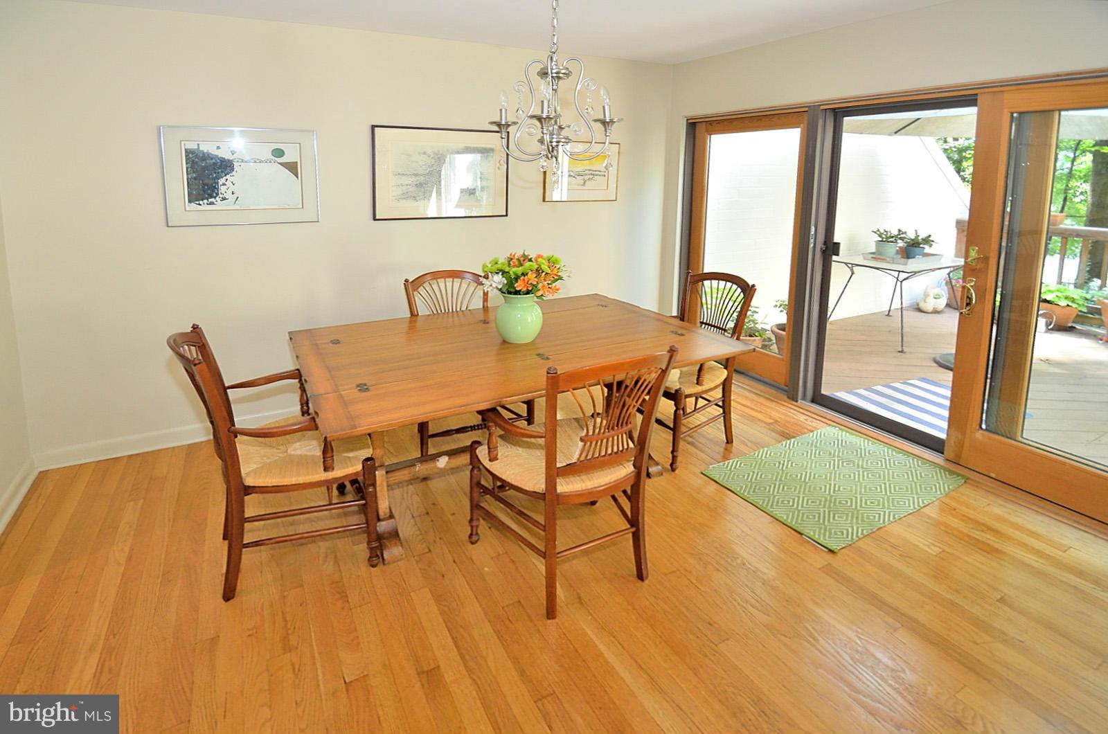 1602 Waters Edge Lane Reston, VA 20190 - Photo 15 of 28 a dining room with furniture and wooden floor