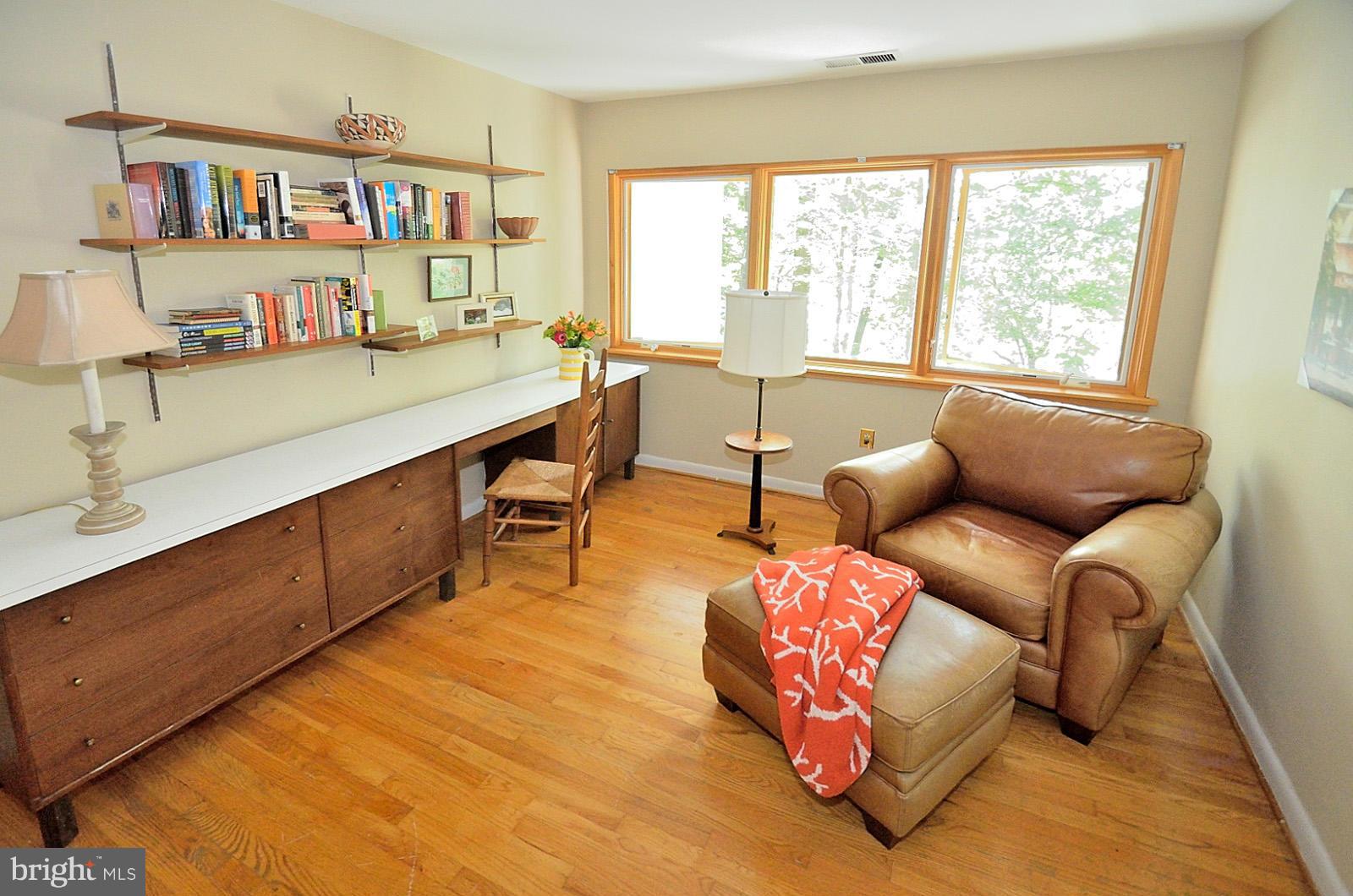 1602 Waters Edge Lane Reston, VA 20190 - Photo 22 of 28 a living room with furniture and a window