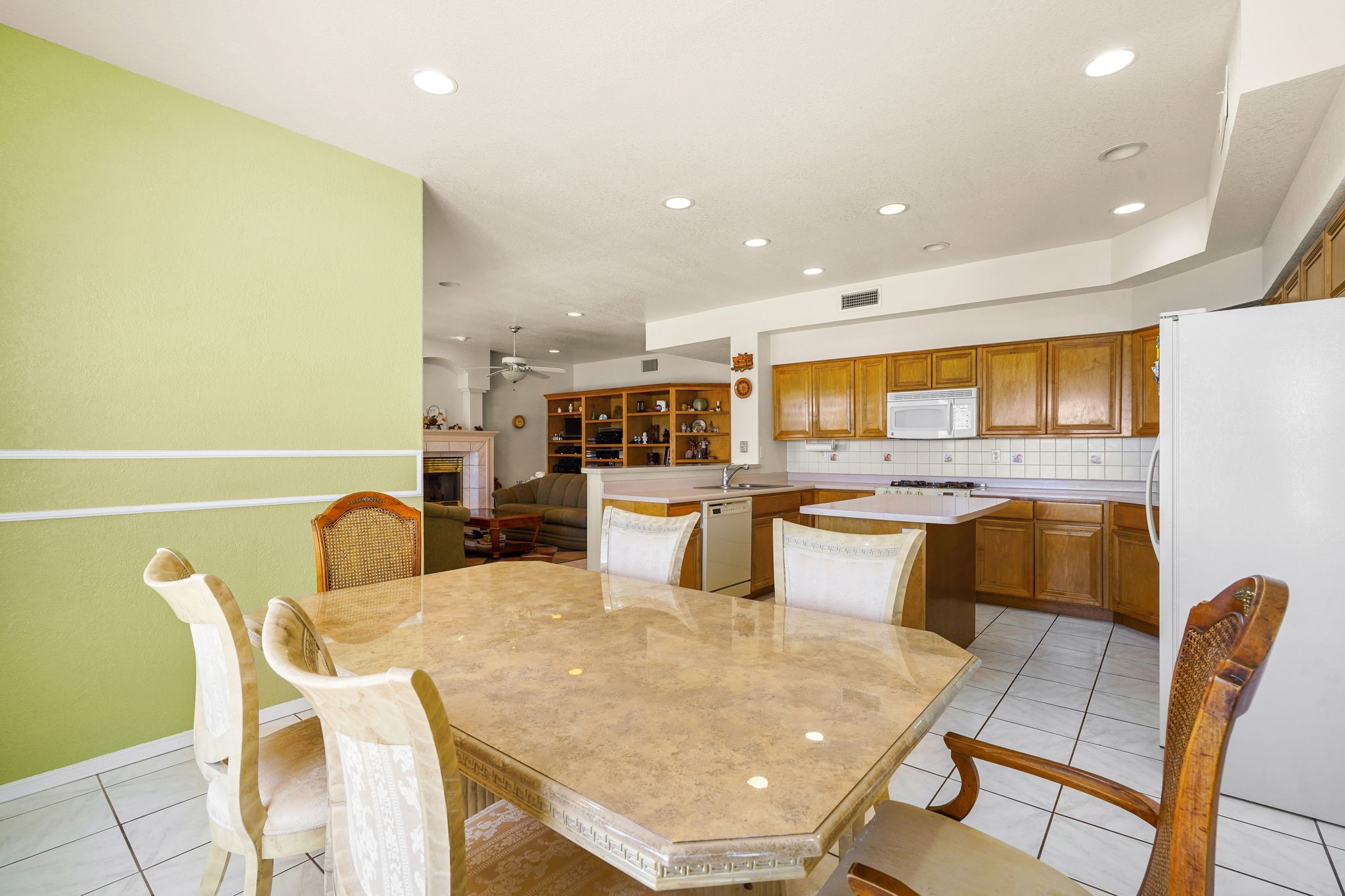 6574 Eagle Ridge Drive El Paso, TX 79912 - Photo 19 of 50 a dining room with furniture and wooden floor