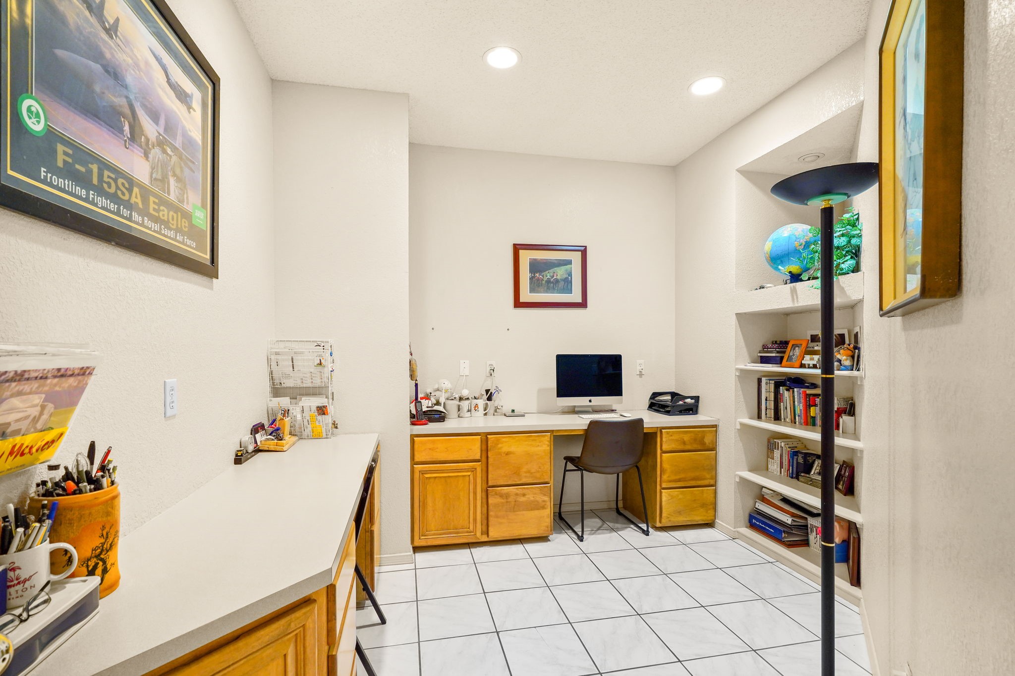 6574 Eagle Ridge Drive El Paso, TX 79912 - Photo 27 of 50 a room with furniture a flat screen tv and a table