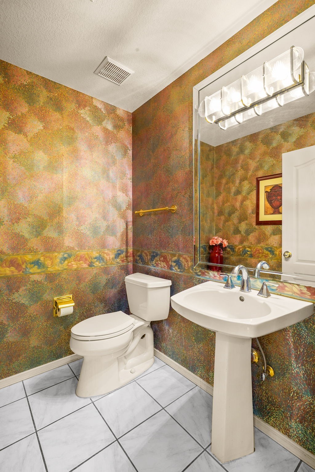 6574 Eagle Ridge Drive El Paso, TX 79912 - Photo 29 of 50 a bathroom with a sink mirror toilet and shower