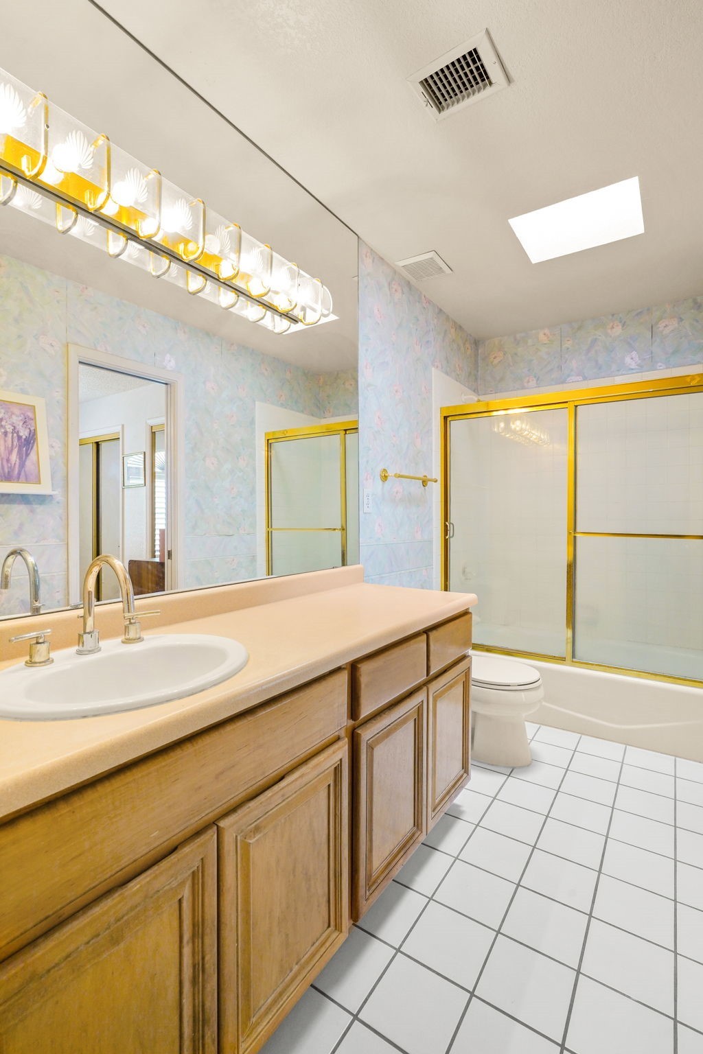 6574 Eagle Ridge Drive El Paso, TX 79912 - Photo 43 of 50 a spacious bathroom with a granite countertop sink and a large mirror