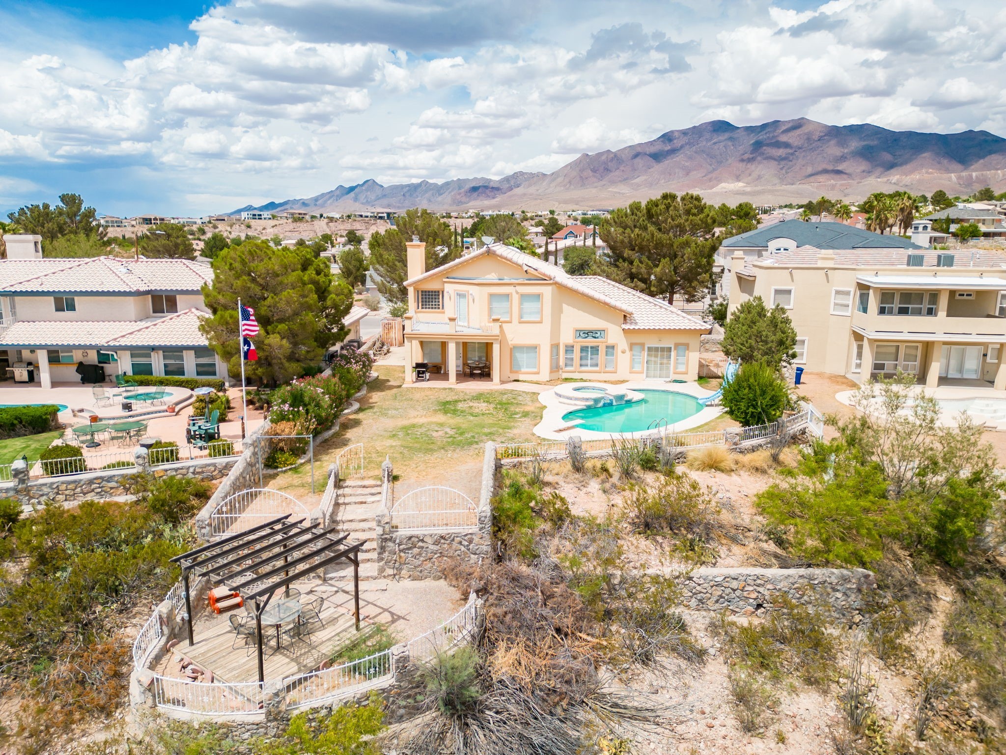 6574 Eagle Ridge Drive El Paso, TX 79912 - Photo 50 of 50 a view of house with yard and sitting area