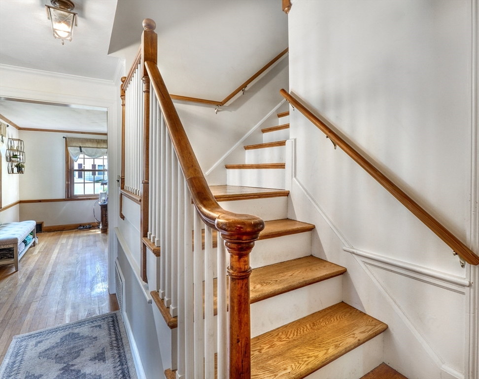 27 Ledyard Road Winchester, MA 01890 - Photo 14 of 38 a view of entryway and hall with wooden floor