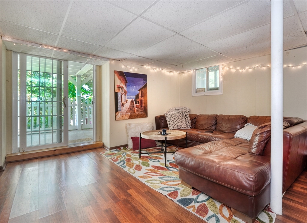 27 Ledyard Road Winchester, MA 01890 - Photo 23 of 38 a living room with furniture and a large window