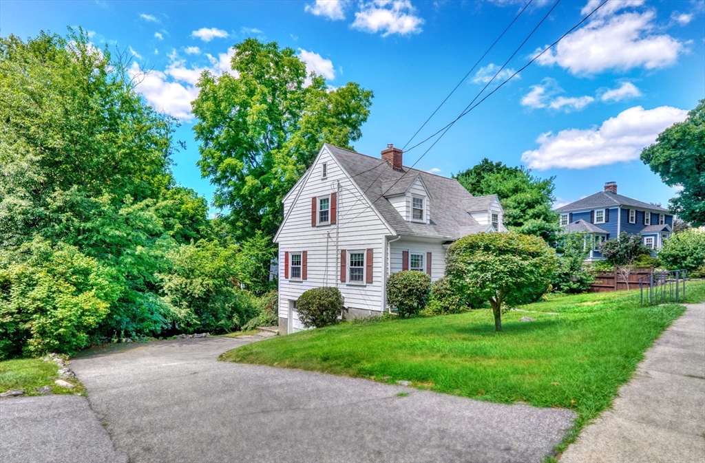 27 Ledyard Road Winchester, MA 01890 - Photo 26 of 38 a front view of a house with a yard