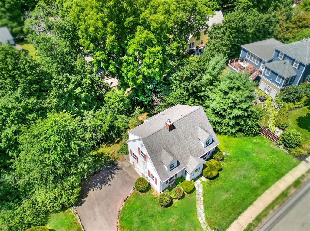 27 Ledyard Road Winchester, MA 01890 - Photo 37 of 38 an aerial view of a house with yard and green space