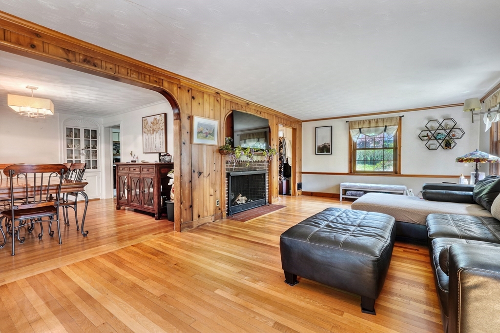 27 Ledyard Road Winchester, MA 01890 - Photo 6 of 38 a living room with furniture and a wooden floor