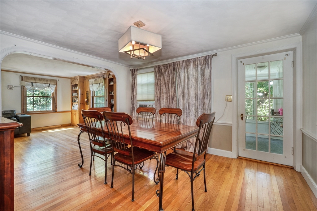 27 Ledyard Road Winchester, MA 01890 - Photo 8 of 38 a view of a dining room with furniture window and wooden floor