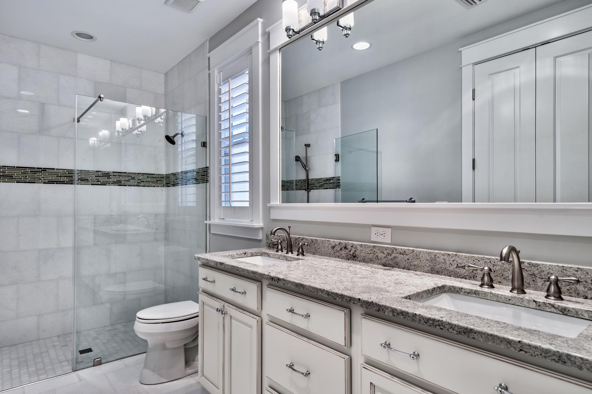 173 Anchor Rode Circle Santa Rosa Beach, FL 32459 - Photo 12 of 35 a bathroom with a granite countertop sink a toilet a large mirror and shower